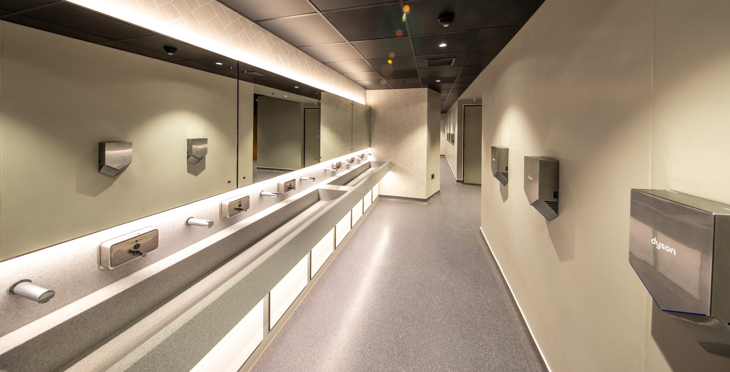 Acrylicon D&eacute;cor in a toilet wash area at Manchester AO Arena