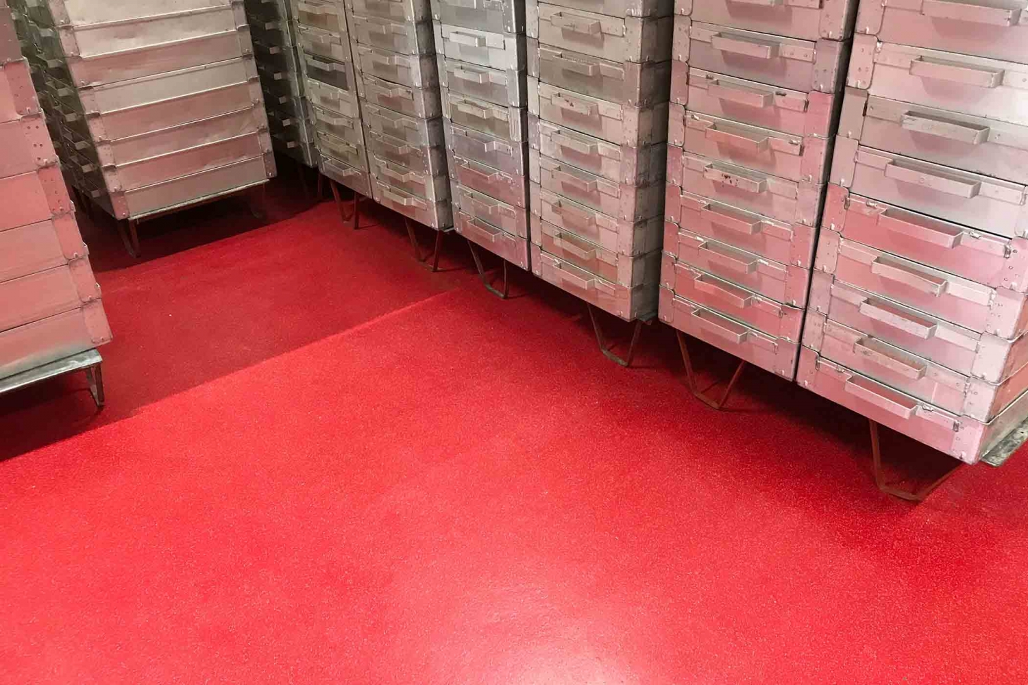 Traffic Red resin flooring in a Tunnock&rsquo;s production area