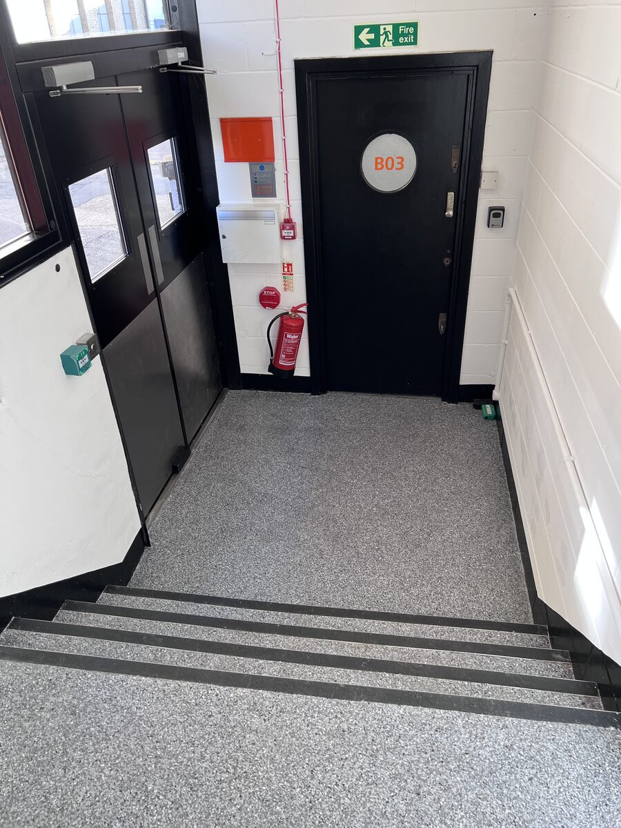 The same entrance and stairs finished in the Acrylicon Flake System